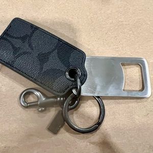New, never used, Coach Outlet black & grey monogram keychain with bottle opener